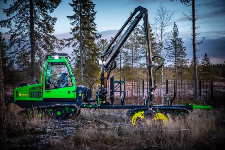 Jarcrac tracked forwarder with Nisula crane operating on wet, soft ground terrain for Jim Wilmer and Sons.